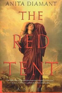 Book cover for The Red Tent by Anita Diamant. A woman in a flowing red robe stands against a dramatic, golden sky.