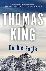 cover of novel Double Eagle by Thomas King. Blue and gray sky and snow peaked mountains on the lower half of the cover.